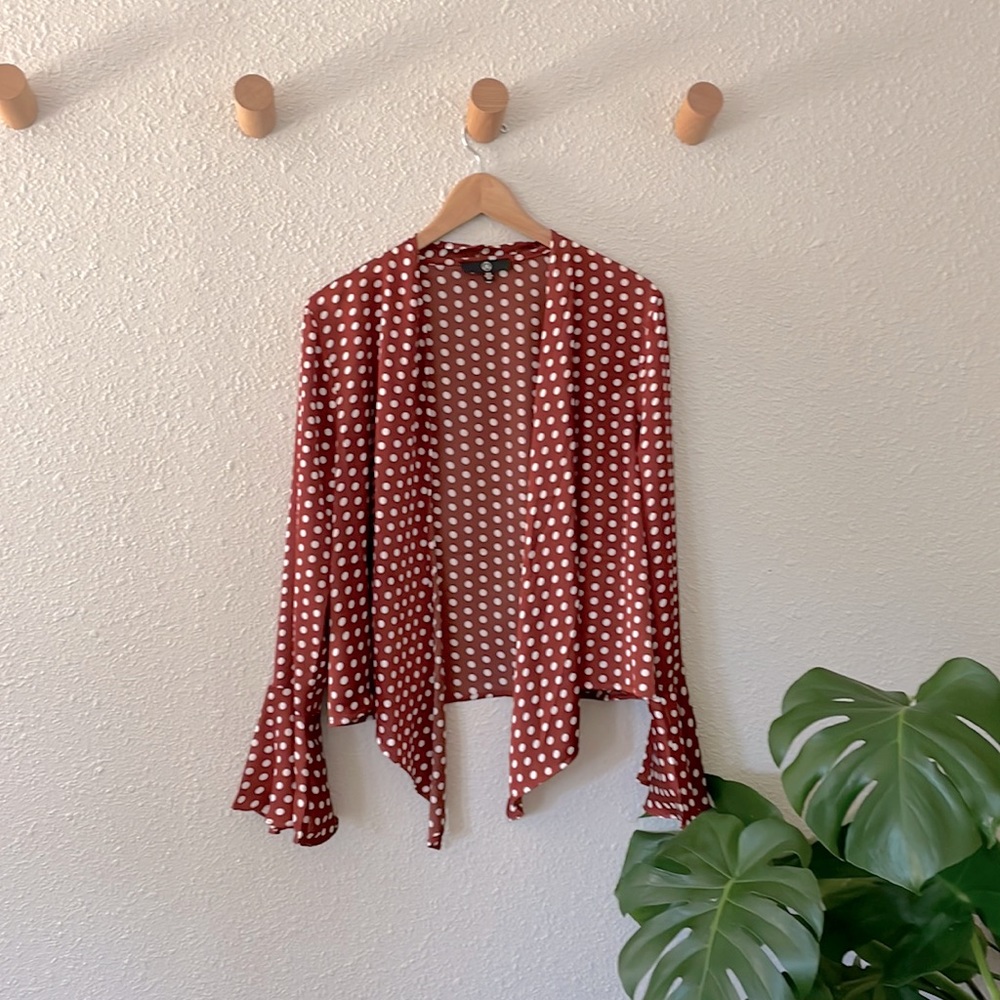 Super flattering polka dot blouse. Brand: M. Brick red with polka dots. Size 2.